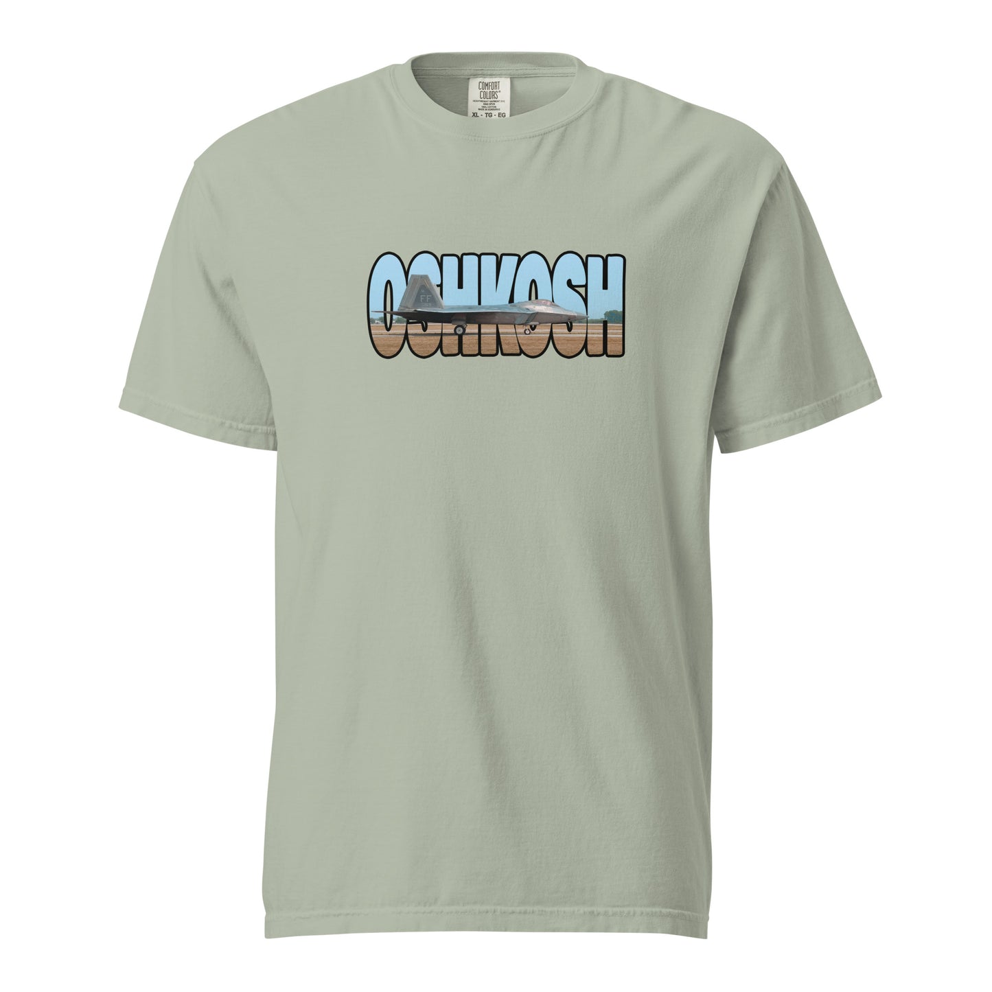 This shirt features an image of an F-22 taxiing at Wittman Regional Airport contained inside of the word "Oshkosh"
