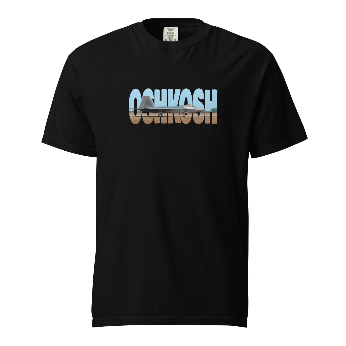 This shirt features an image of an F-22 taxiing at Wittman Regional Airport contained inside of the word "Oshkosh"