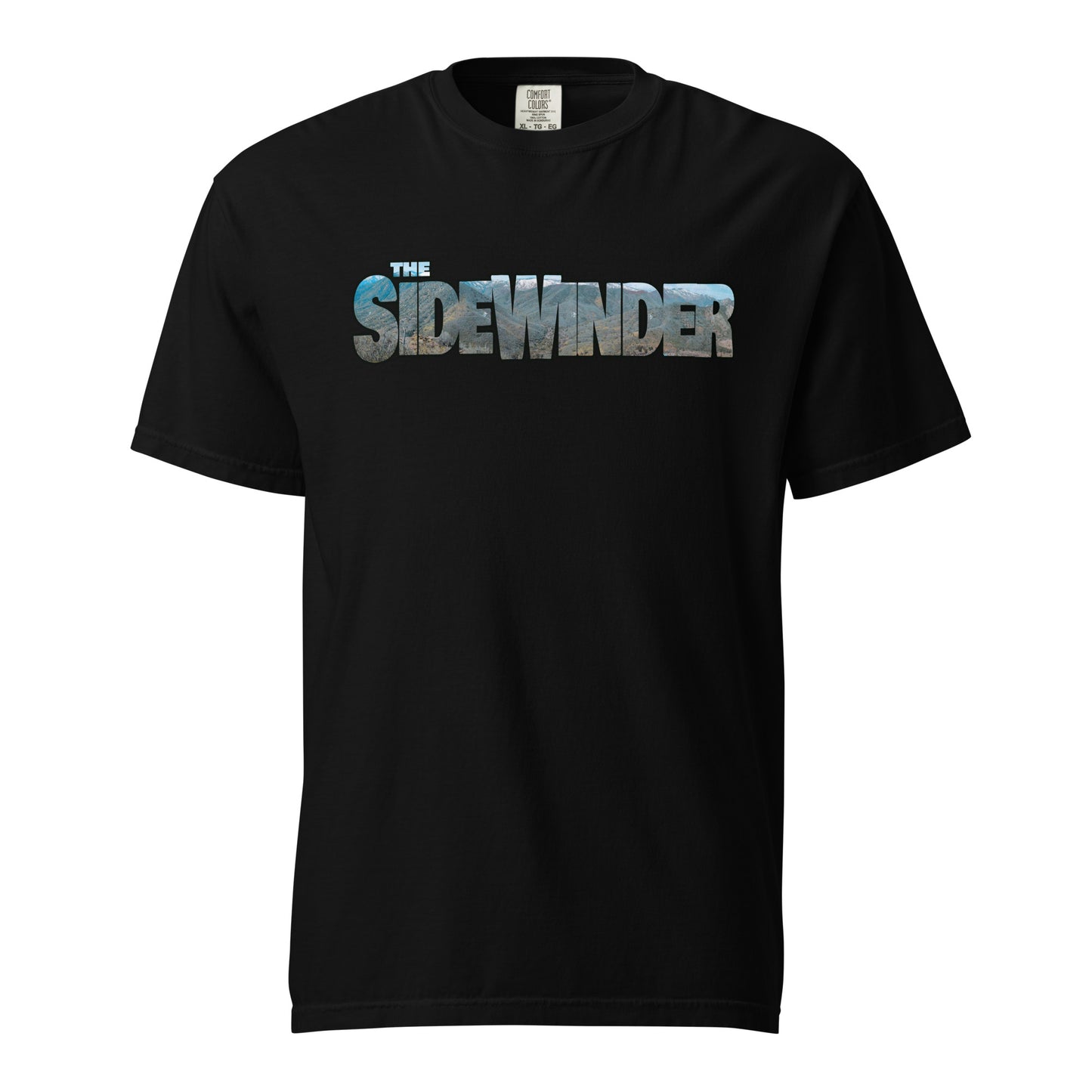 This shirt features an image of a an F-35 performing a low level pass through mountains contained inside of the words "The Sidewinder"