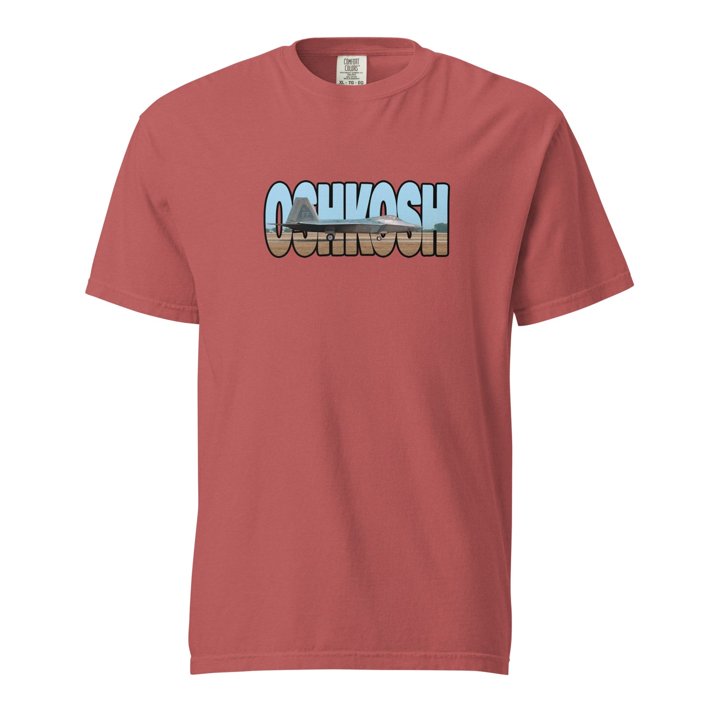 This shirt features an image of an F-22 taxiing at Wittman Regional Airport contained inside of the word "Oshkosh"