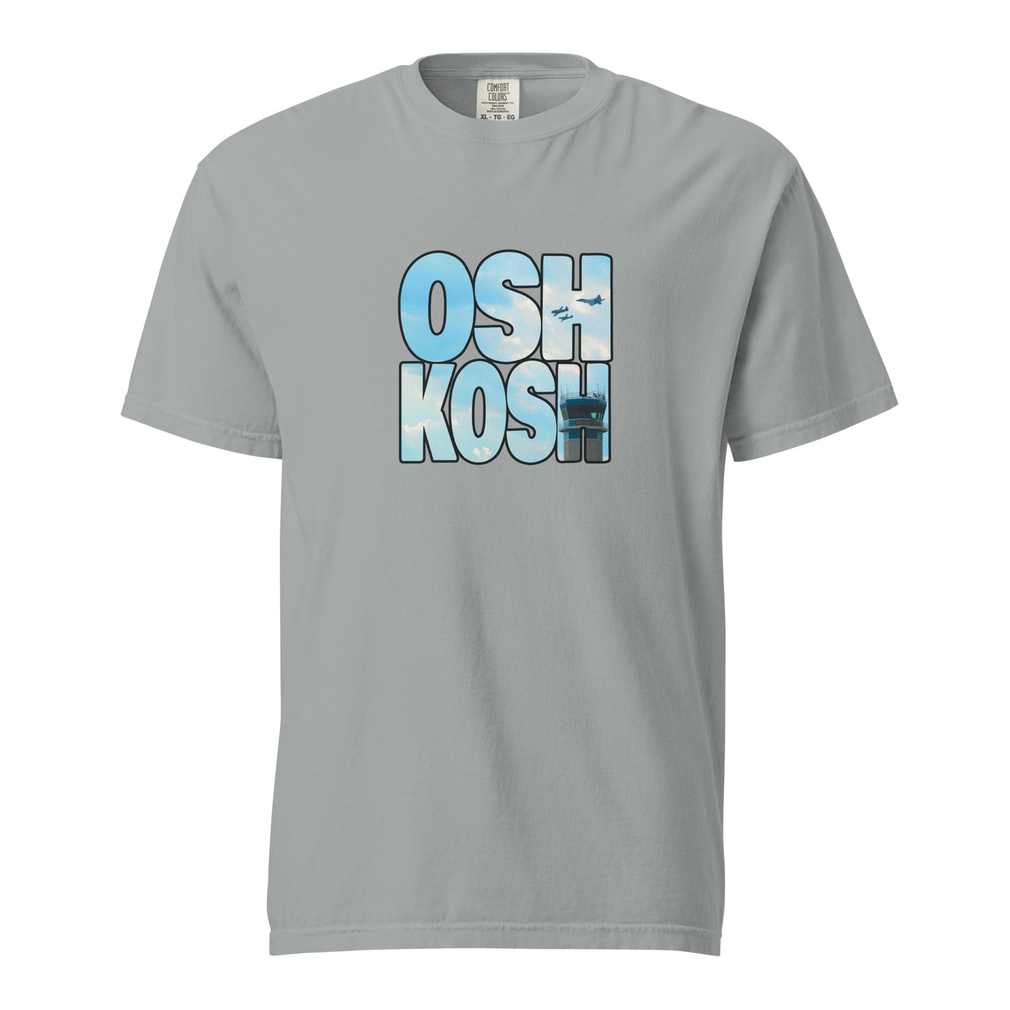 This shirt features an image of a heritage flight over the tower at Wittman Regional Airport contained inside of the word "Oshkosh"