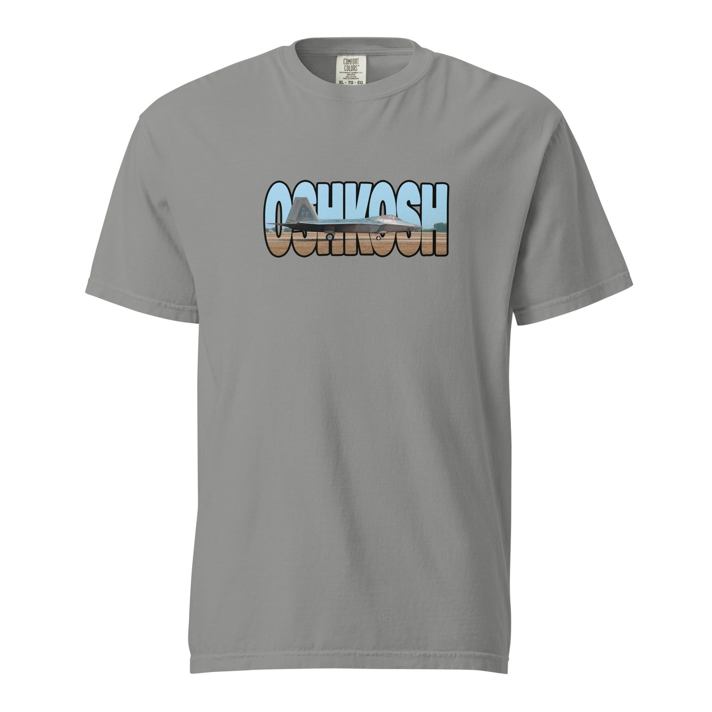 This shirt features an image of an F-22 taxiing at Wittman Regional Airport contained inside of the word "Oshkosh"