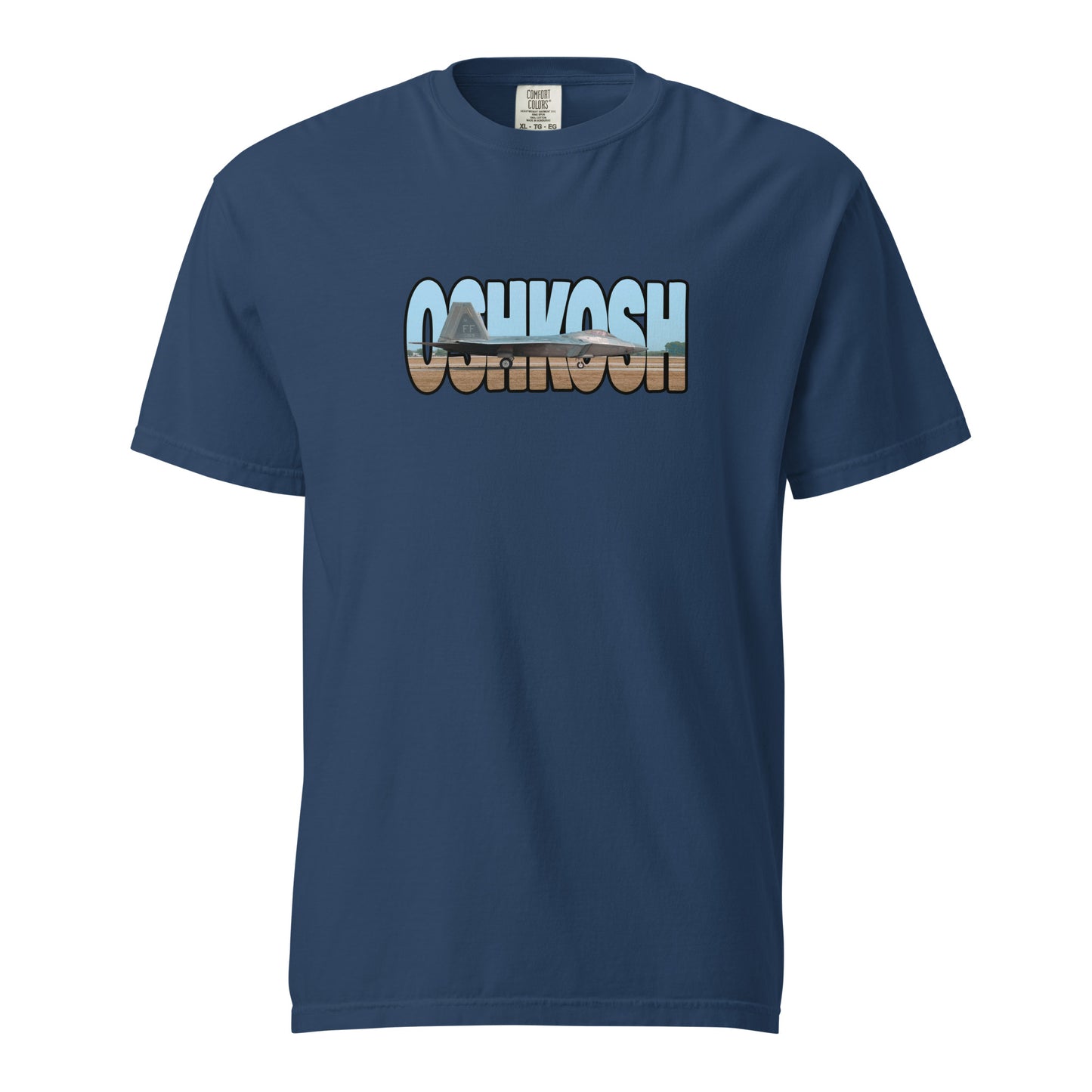 This shirt features an image of an F-22 taxiing at Wittman Regional Airport contained inside of the word "Oshkosh"