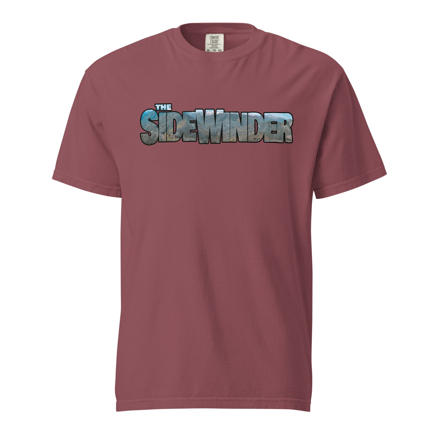 This shirt features an image of a an F-35 performing a low level pass through mountains contained inside of the words "The Sidewinder"
