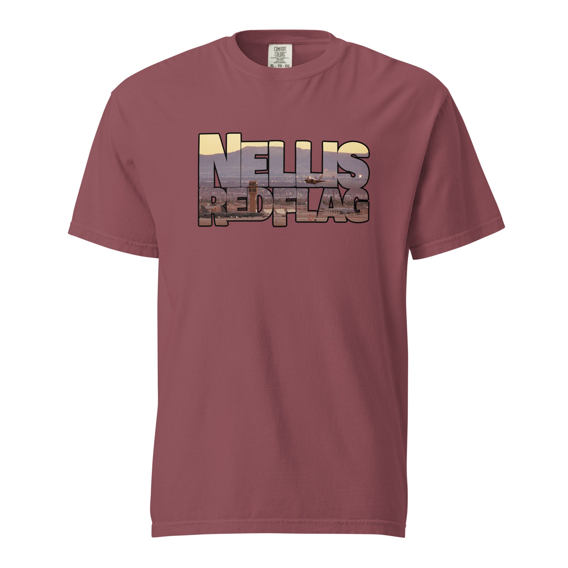 This shirt features an image of an F-35 taking off from Nellis Air Force Base contained inside of the words "Nellis Red Flag"