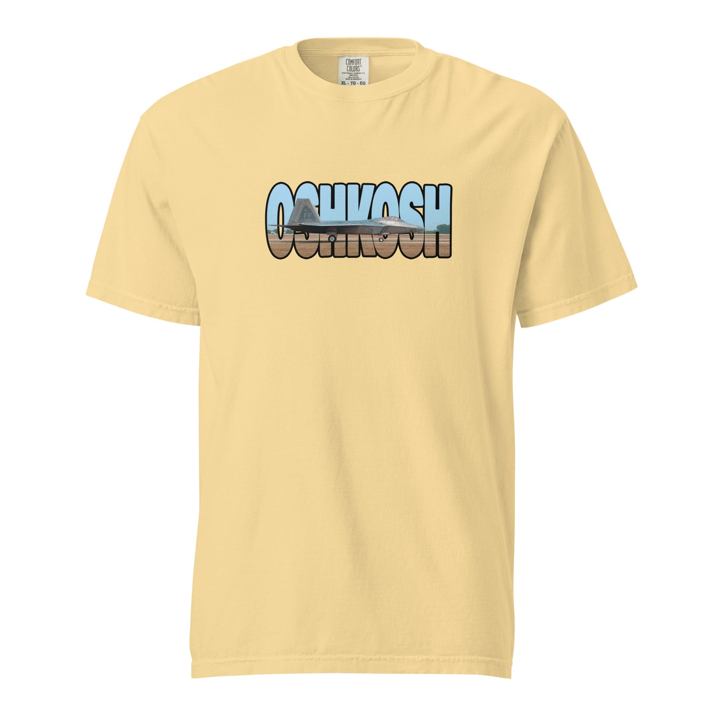 This shirt features an image of an F-22 taxiing at Wittman Regional Airport contained inside of the word "Oshkosh"