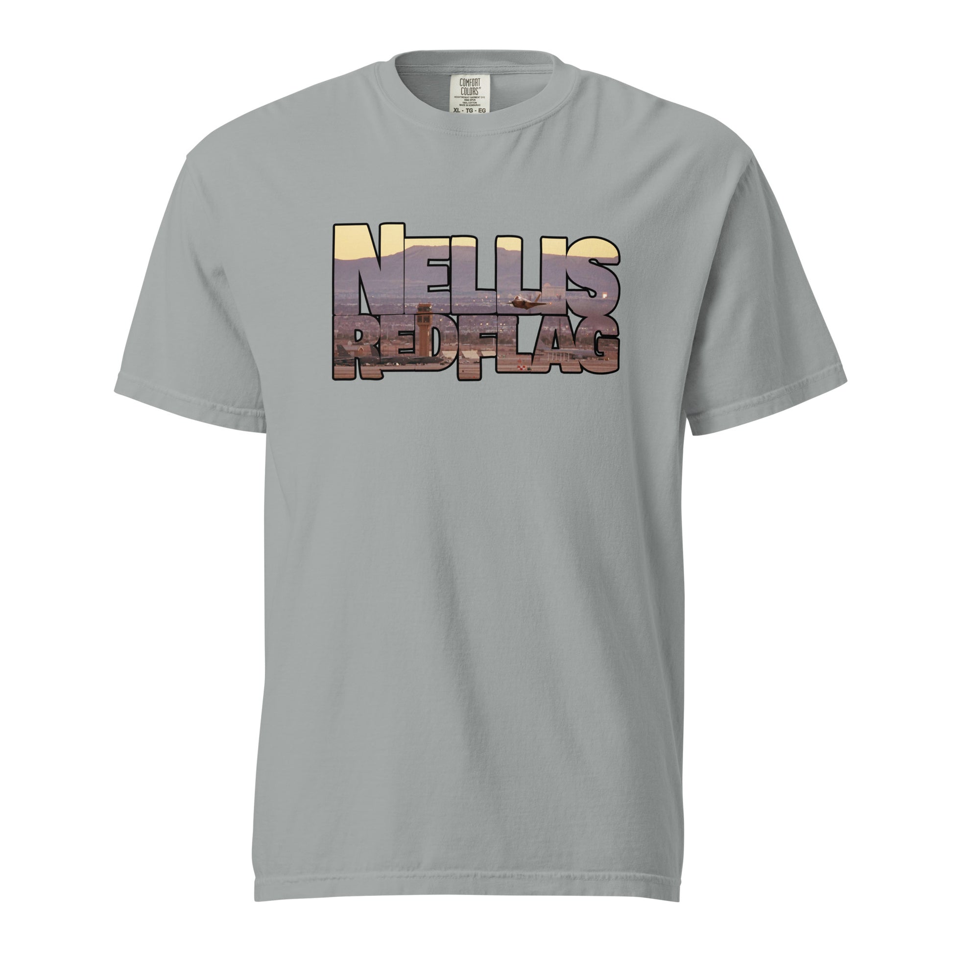 This shirt features an image of an F-35 taking off from Nellis Air Force Base contained inside of the words "Nellis Red Flag"